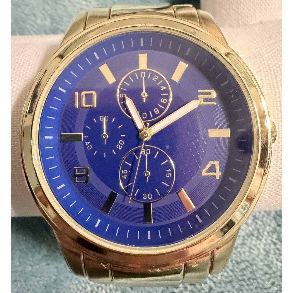 FMD Gold Tone Chronograph Style Watch Blue Dial Roman Numerals Base Metal